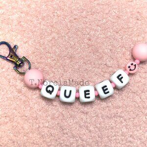 QUE3F: Silicone Offensive Keychain: Pale Pink
